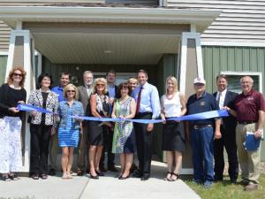 State and local officials celebrate the opening of The Landing in Bowman, ND.